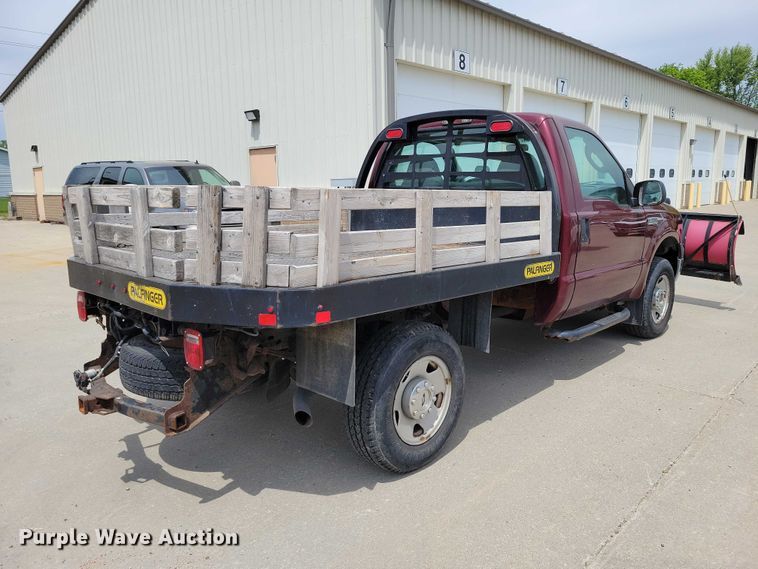 image for item DZ7118 2006 Ford F250 Super Duty flatbed pickup truck