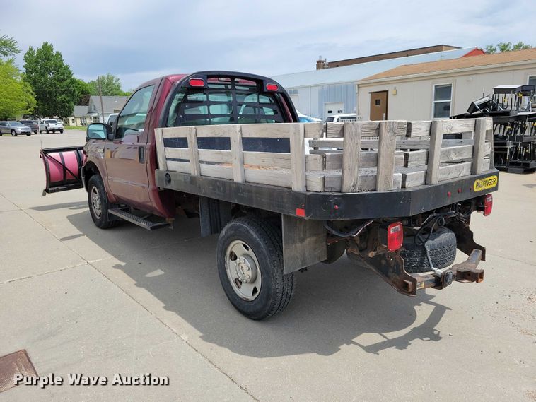 image for item DZ7118 2006 Ford F250 Super Duty flatbed pickup truck