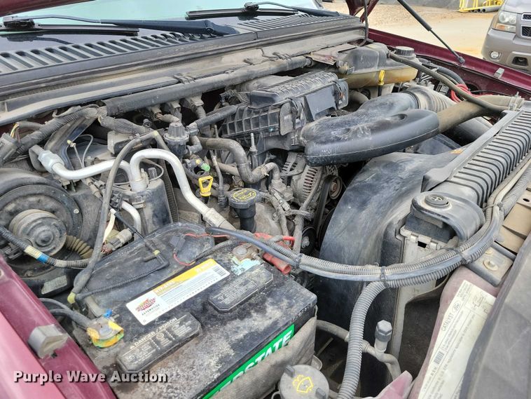 image for item DZ7118 2006 Ford F250 Super Duty flatbed pickup truck