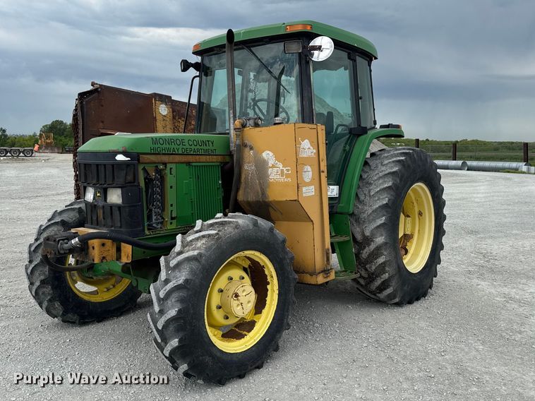 image for item EA2342 2001 John Deere 6405 MFWD tractor