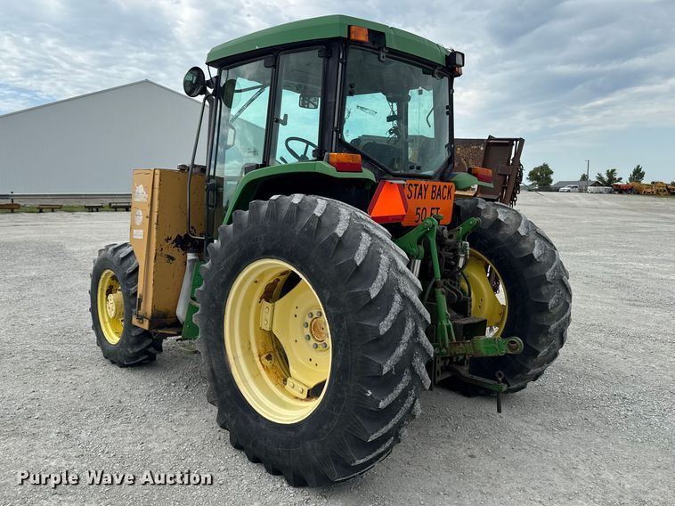 image for item EA2342 2001 John Deere 6405 MFWD tractor