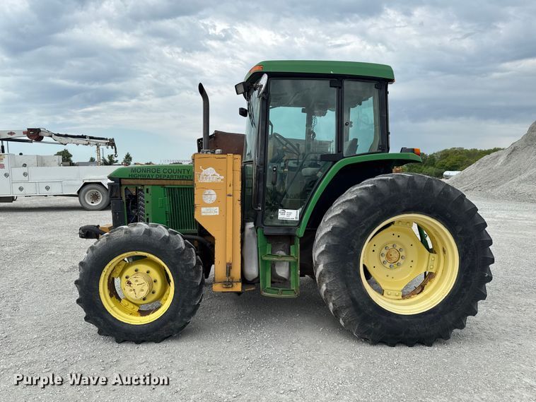 image for item EA2342 2001 John Deere 6405 MFWD tractor