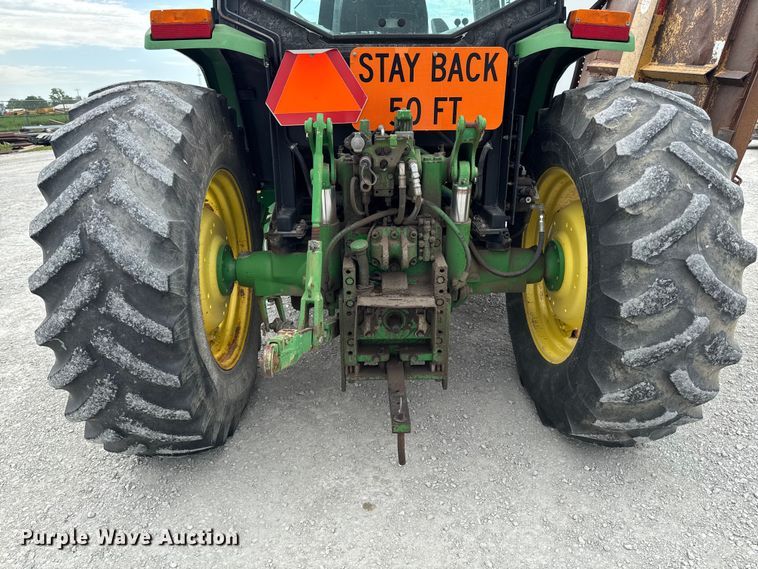 image for item EA2342 2001 John Deere 6405 MFWD tractor