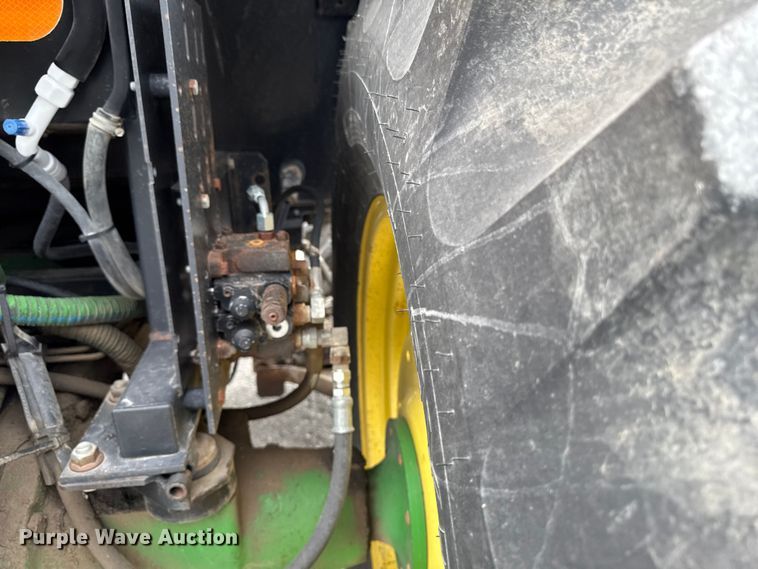 image for item EA2342 2001 John Deere 6405 MFWD tractor