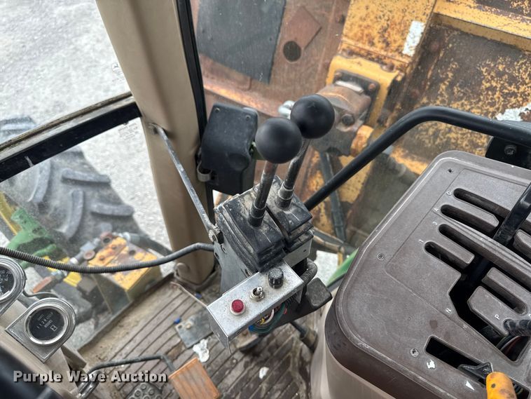 image for item EA2342 2001 John Deere 6405 MFWD tractor