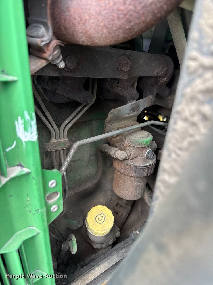 image for item EA2342 2001 John Deere 6405 MFWD tractor
