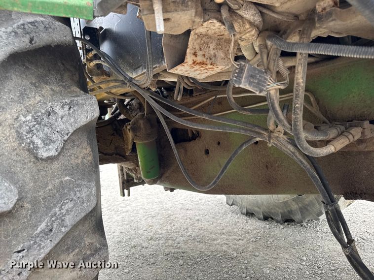 image for item EA2342 2001 John Deere 6405 MFWD tractor