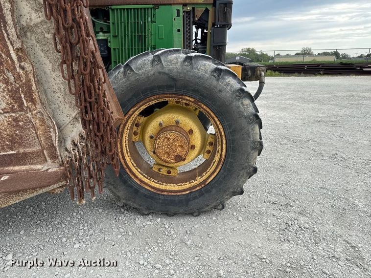 image for item EA2342 2001 John Deere 6405 MFWD tractor
