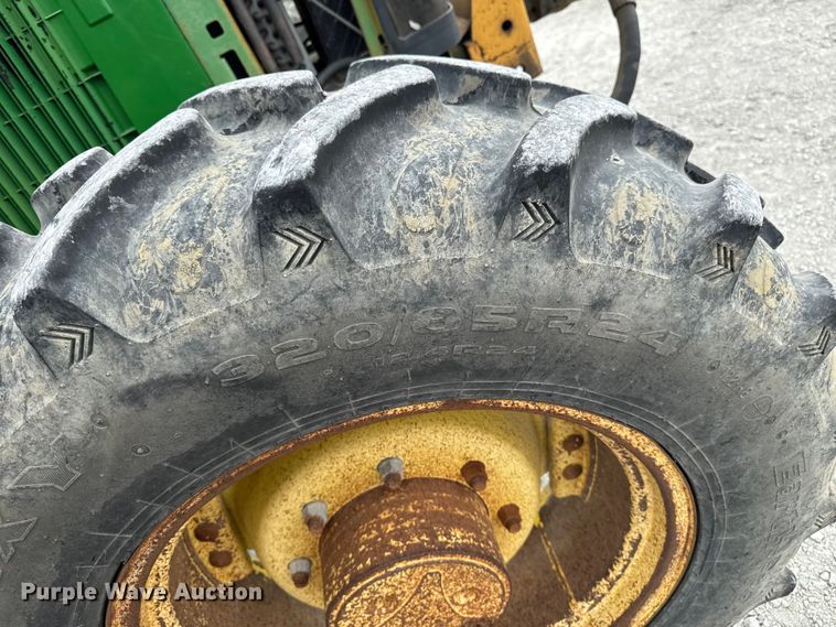 image for item EA2342 2001 John Deere 6405 MFWD tractor