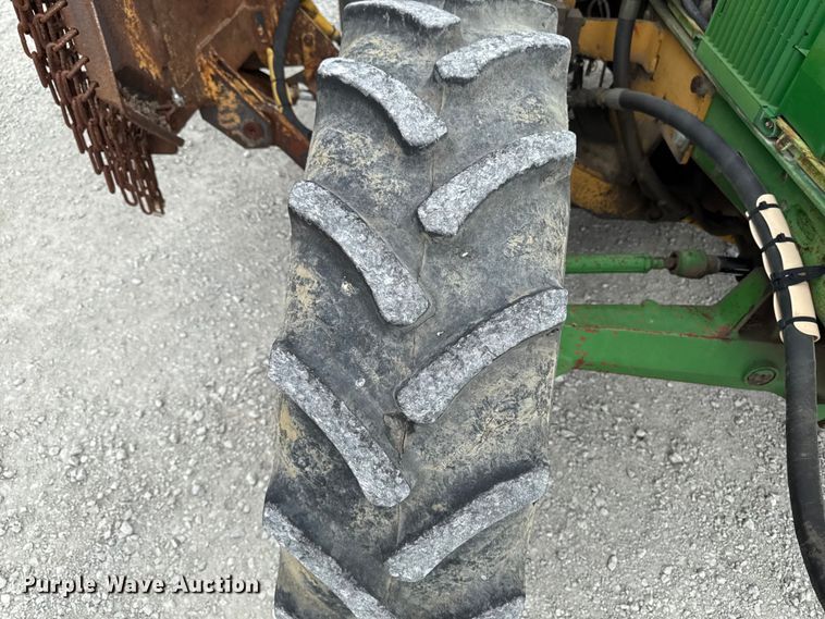 image for item EA2342 2001 John Deere 6405 MFWD tractor