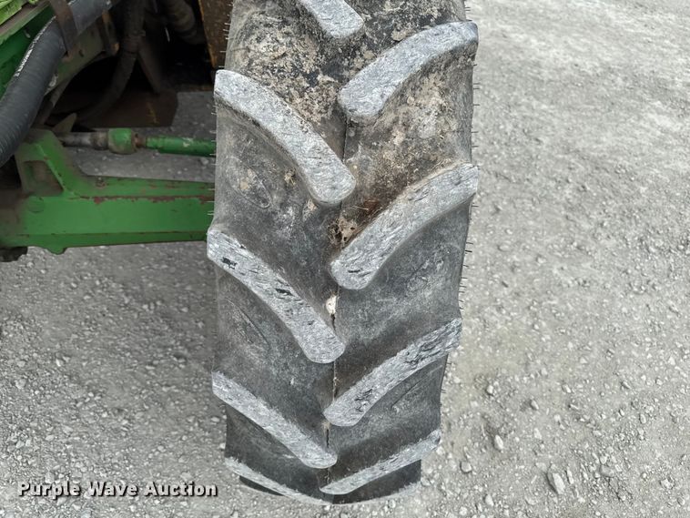 image for item EA2342 2001 John Deere 6405 MFWD tractor