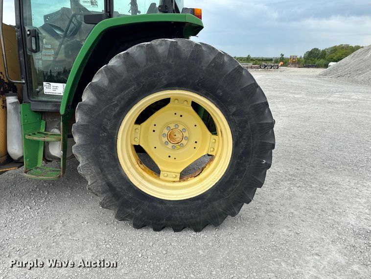 image for item EA2342 2001 John Deere 6405 MFWD tractor