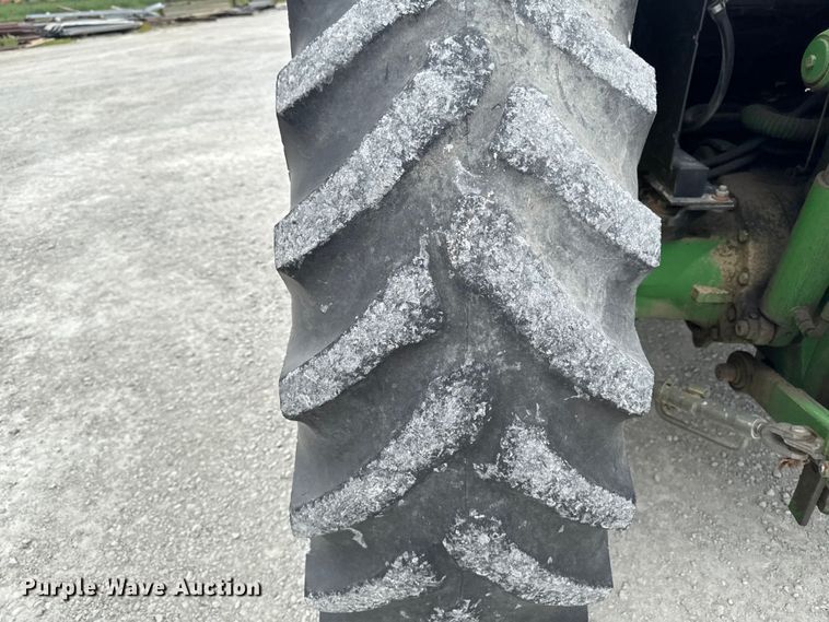 image for item EA2342 2001 John Deere 6405 MFWD tractor