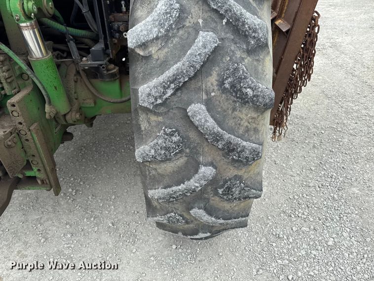 image for item EA2342 2001 John Deere 6405 MFWD tractor
