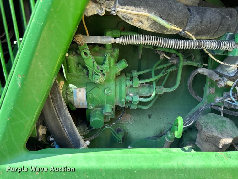 image for item EF2471 2000 John Deere 7210 MFWD tractor
