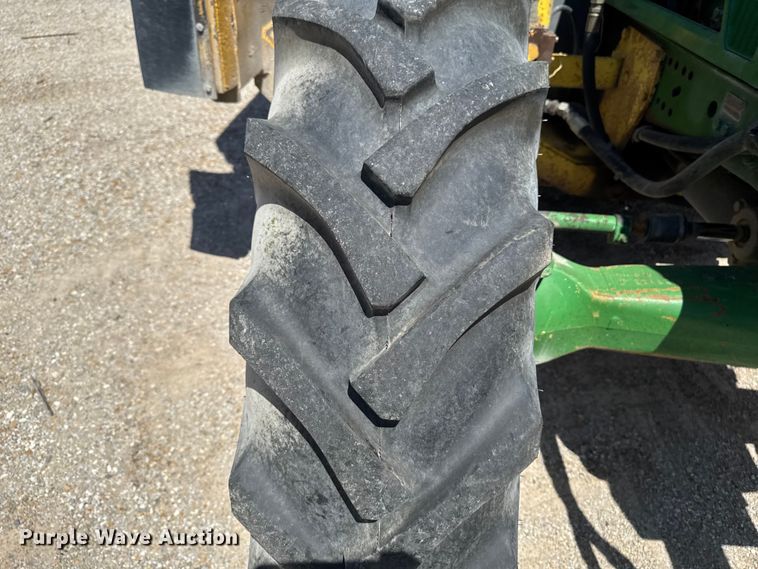 image for item EF2471 2000 John Deere 7210 MFWD tractor