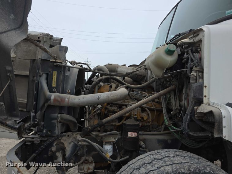 image for item FH6062 1999 Volvo WG64 asphalt slurry truck