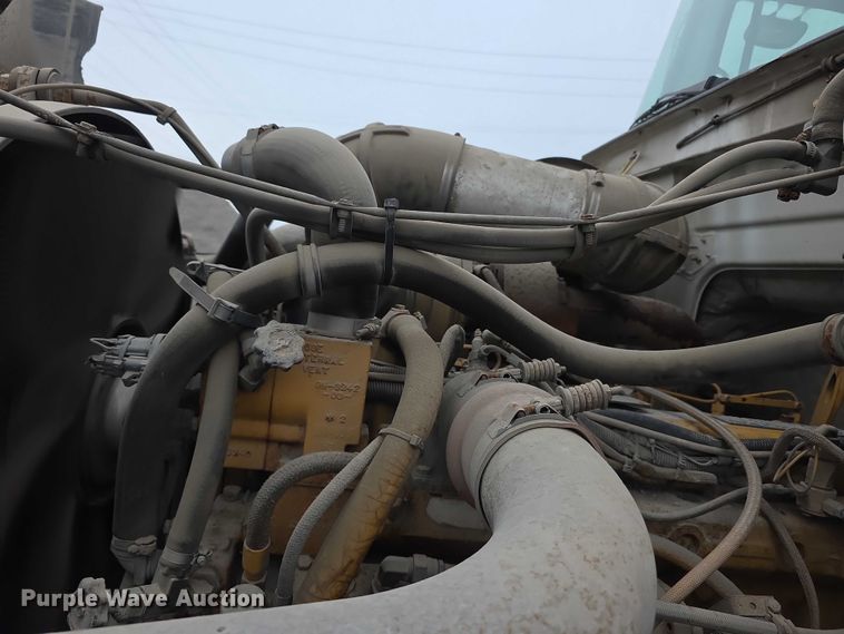 image for item FH6062 1999 Volvo WG64 asphalt slurry truck