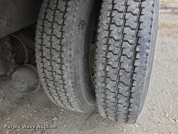 image for item FH6062 1999 Volvo WG64 asphalt slurry truck