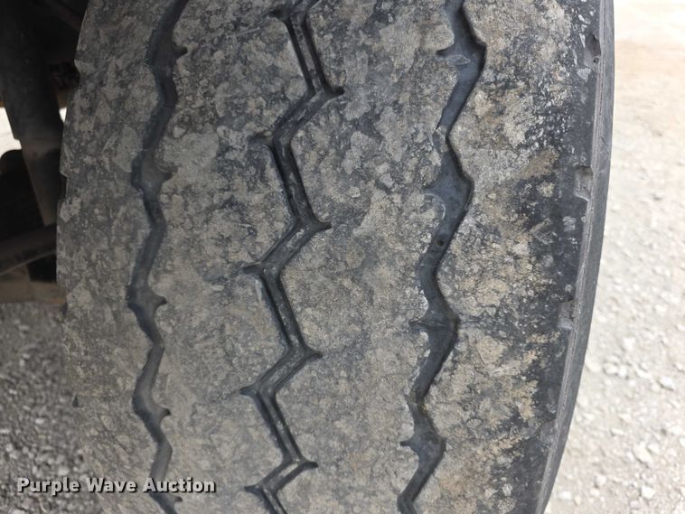 image for item FH6062 1999 Volvo WG64 asphalt slurry truck