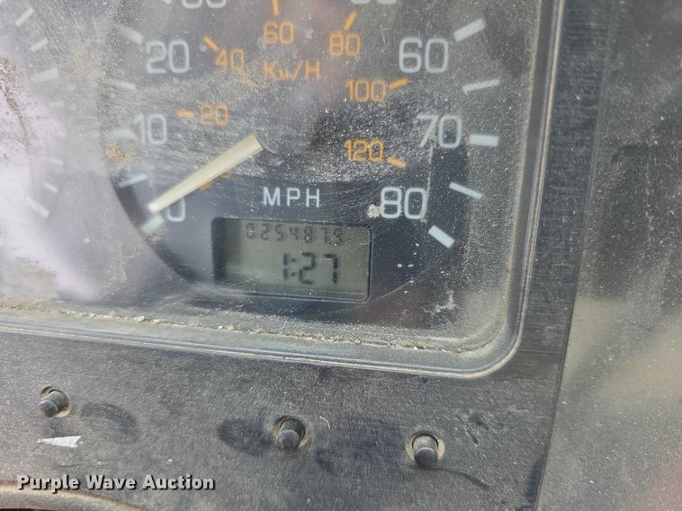 image for item FH6062 1999 Volvo WG64 asphalt slurry truck