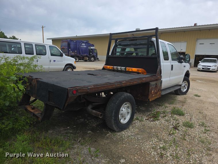 image for item FH6106 2002 Ford F350 Super Duty Ext. Cab flatbed pickup truck