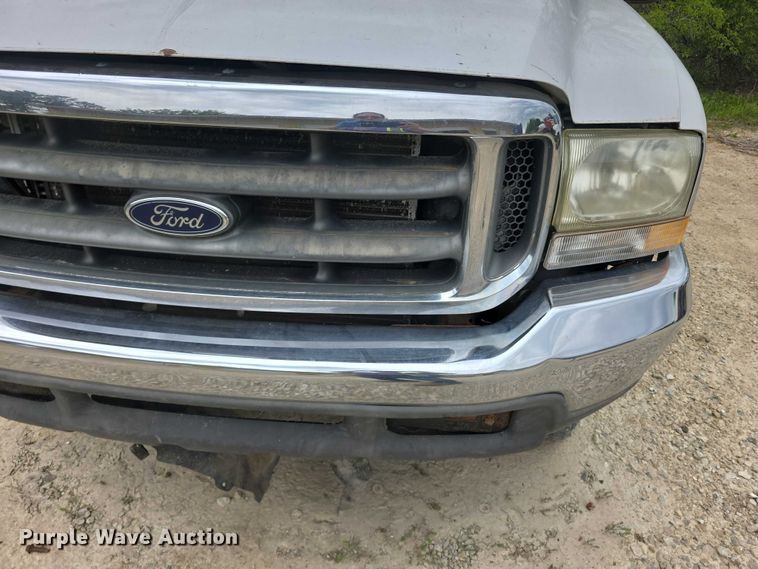 image for item FH6106 2002 Ford F350 Super Duty Ext. Cab flatbed pickup truck