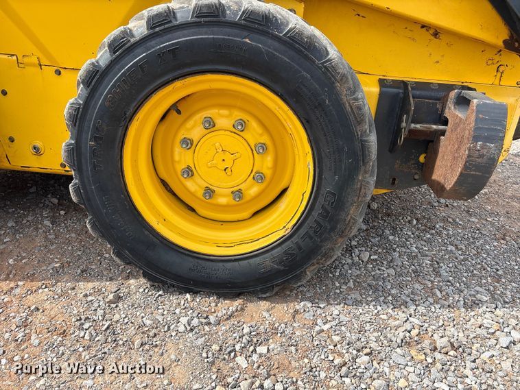 image for item FK2607 2003 New Holland LS170 skid steer loader