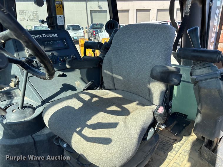 image for item FN5669 2014 John Deere 410K backhoe