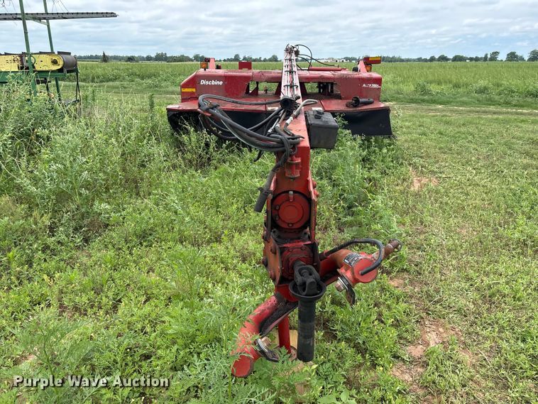 image for item EA7292 New Holland H7450 swather / windrower