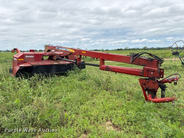 image for item EA7292 New Holland H7450 swather / windrower