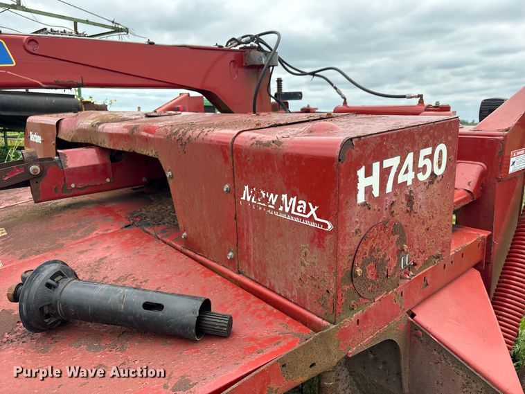 image for item EA7292 New Holland H7450 swather / windrower