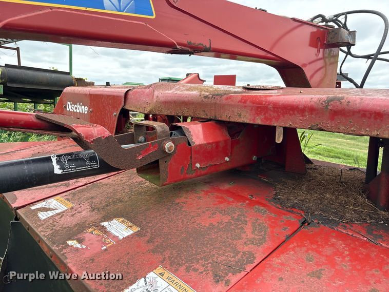 image for item EA7292 New Holland H7450 swather / windrower