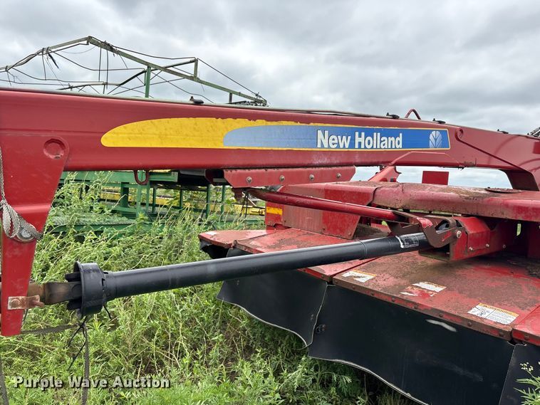 image for item EA7292 New Holland H7450 swather / windrower