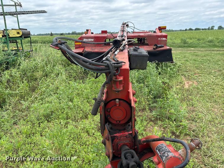 image for item EA7292 New Holland H7450 swather / windrower