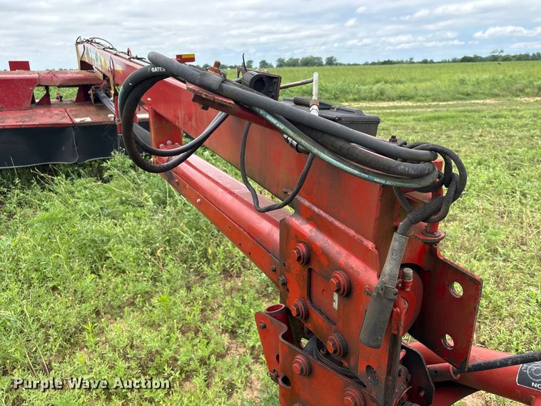 image for item EA7292 New Holland H7450 swather / windrower