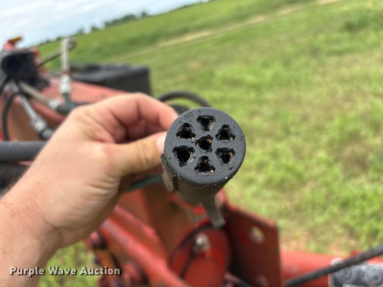 image for item EA7292 New Holland H7450 swather / windrower
