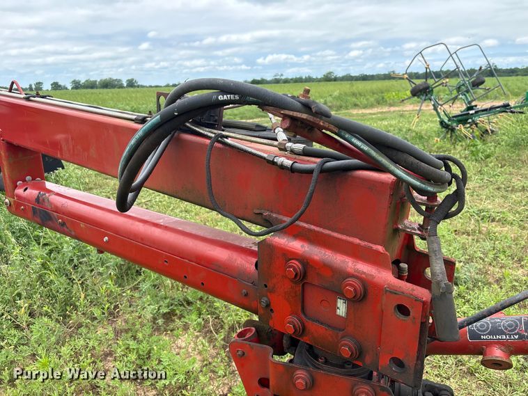 image for item EA7292 New Holland H7450 swather / windrower