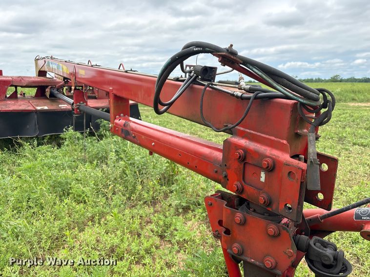 image for item EA7292 New Holland H7450 swather / windrower