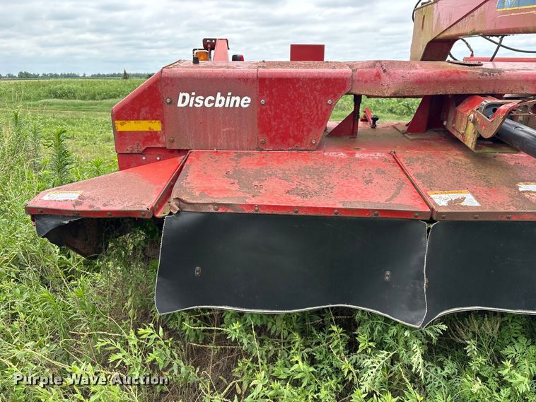 image for item EA7292 New Holland H7450 swather / windrower