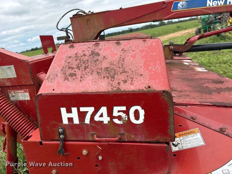 image for item EA7292 New Holland H7450 swather / windrower
