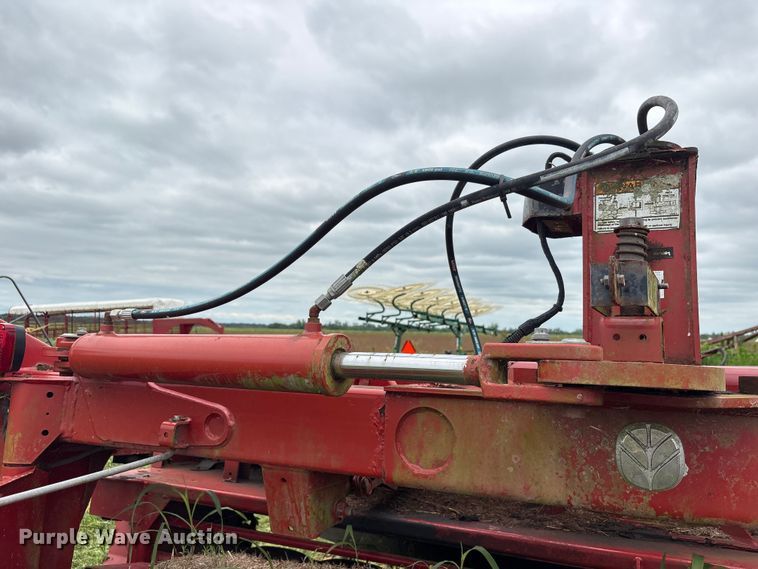 image for item EA7292 New Holland H7450 swather / windrower