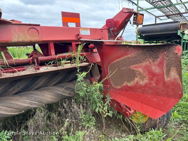 image for item EA7292 New Holland H7450 swather / windrower