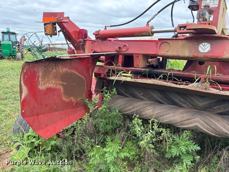 image for item EA7292 New Holland H7450 swather / windrower