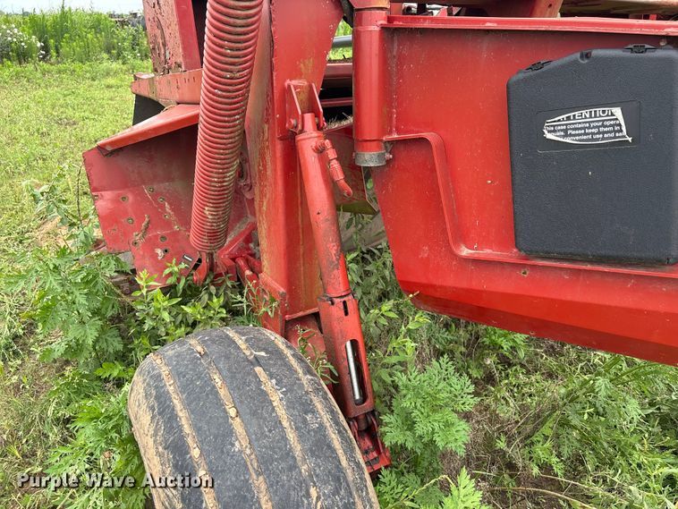 image for item EA7292 New Holland H7450 swather / windrower
