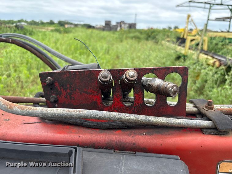 image for item EA7292 New Holland H7450 swather / windrower