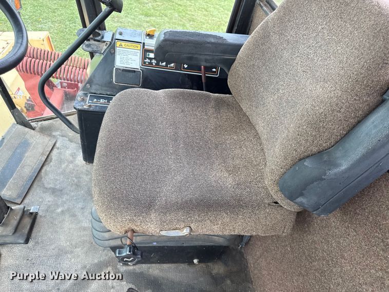image for item EC4585 1997 New Holland 2550 swather / windrower