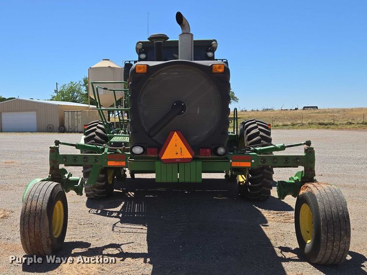 image for item EW0137 2012 John Deere R450 swather / windrower