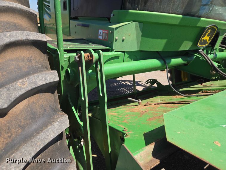 image for item EW0137 2012 John Deere R450 swather / windrower