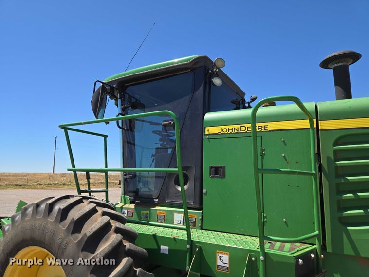 image for item EW0137 2012 John Deere R450 swather / windrower